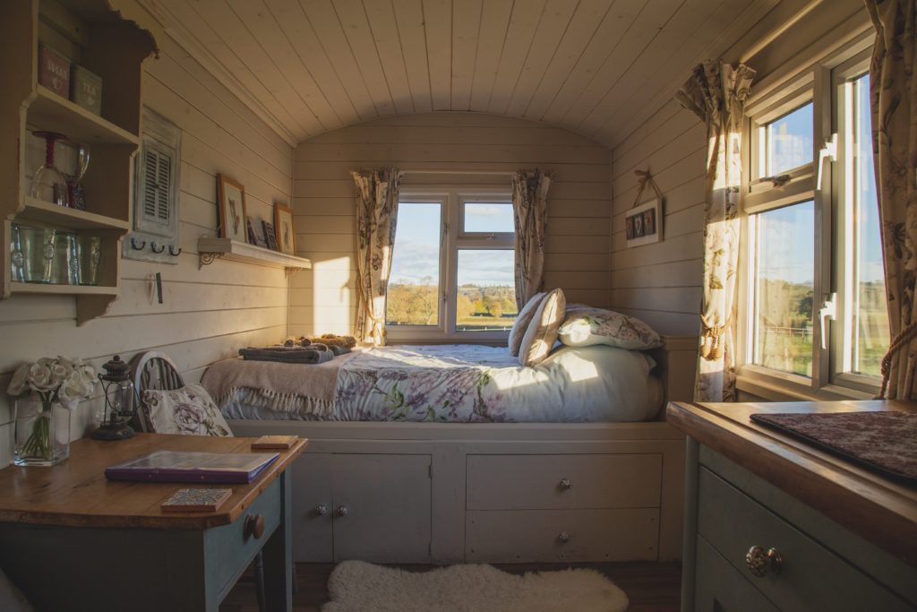 Tiny house bedroom in a shepherds hut.